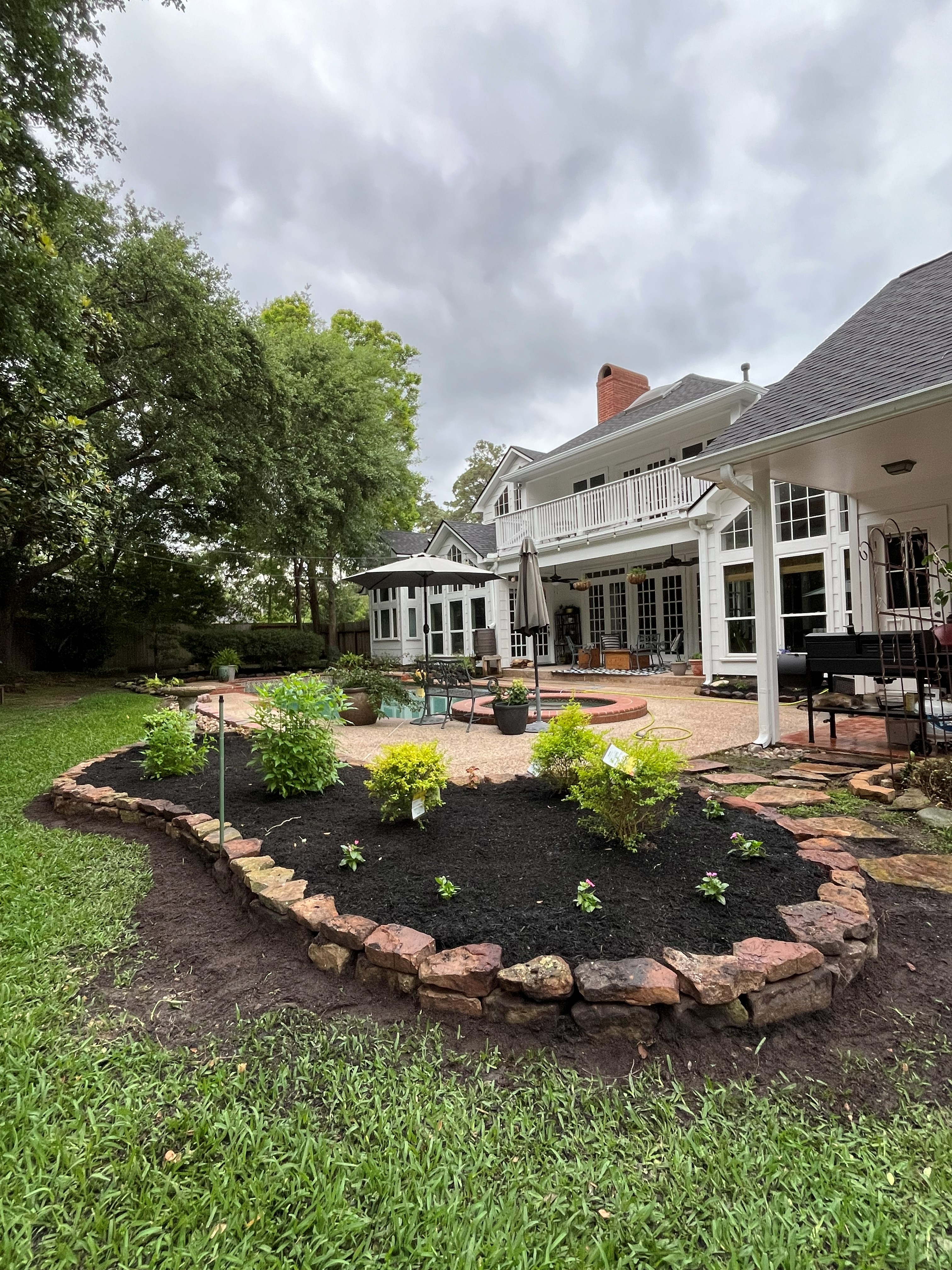 Moss rock planting bed Kingwood TX